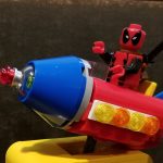 Lego Deadpool on a Rocket Ride