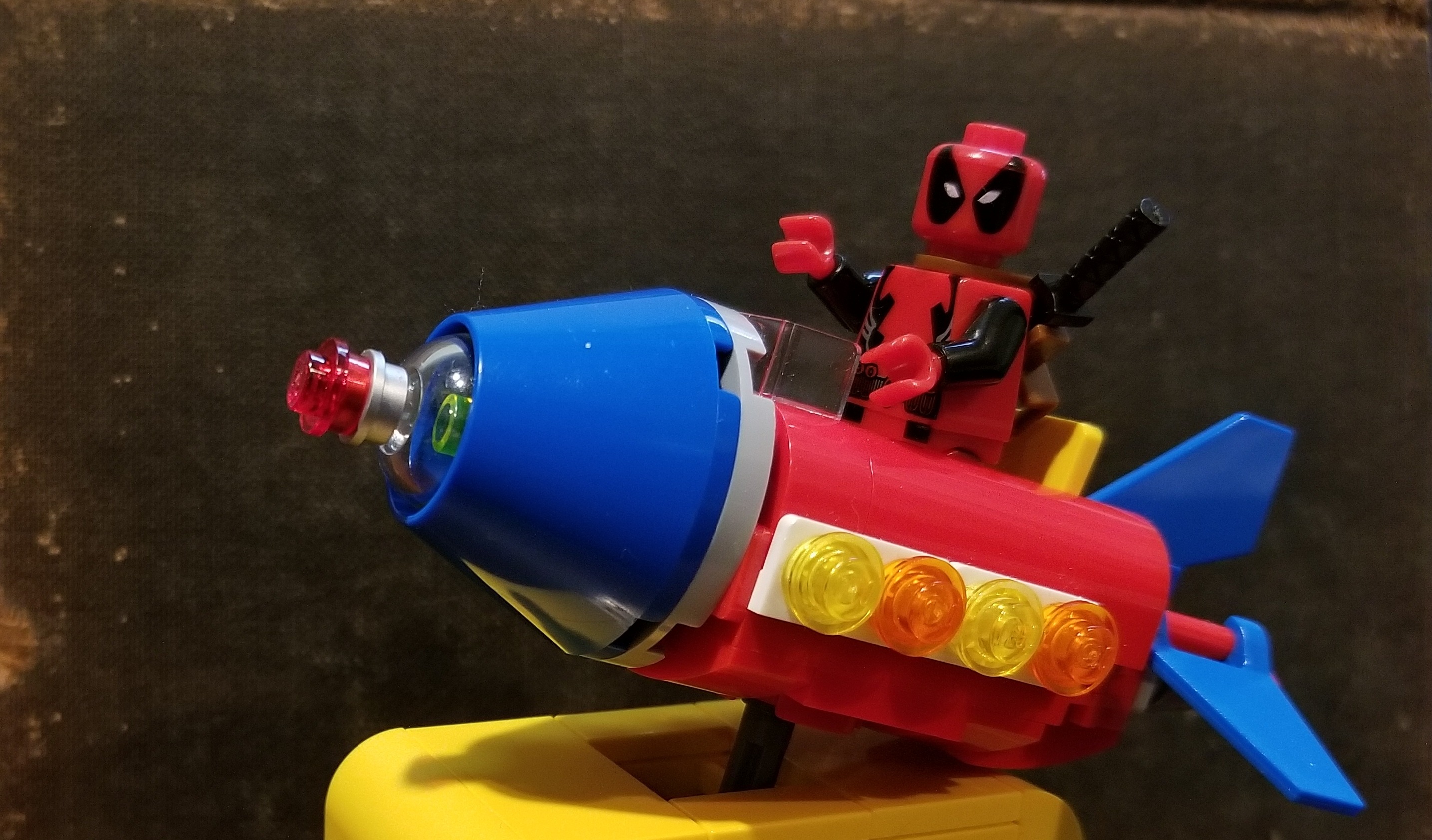 Lego Deadpool on a Rocket Ride